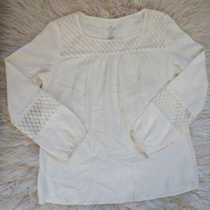 Cream blouse with lace accents